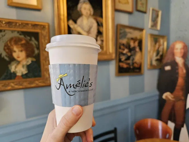 Coffee cup from Amélie's French Bakery in North Carolina