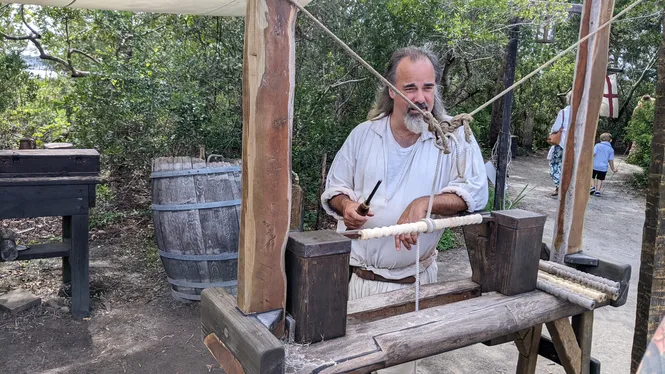 1500s-style woodworker at Roanoke Island Festival Park in the Outer Banks, NC